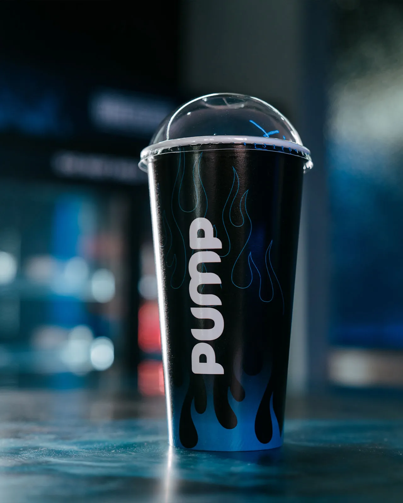 A branded Pump Kitchens AE cup