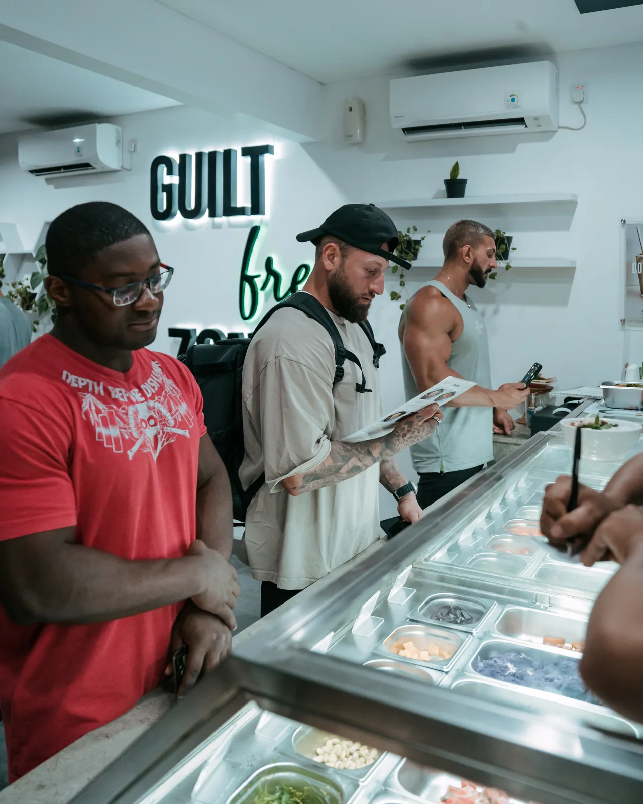 Guests ordering at the Pump Kitchens AE counter